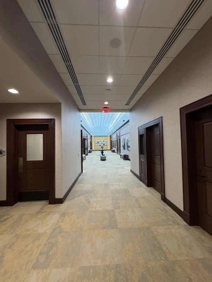 Flooring, wallpaper, and painting at City of Southlake Legends Hall